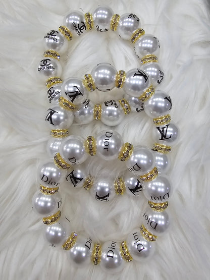 Designer bracelets for adults. Gold or silver available