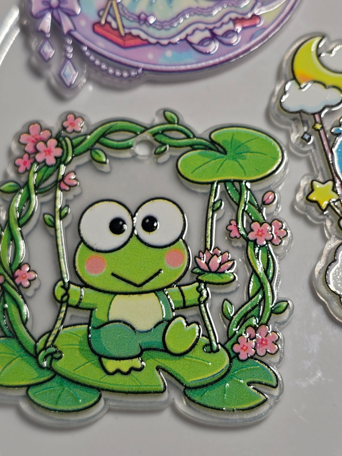Acrylic Pendant: Sansan family on a swing