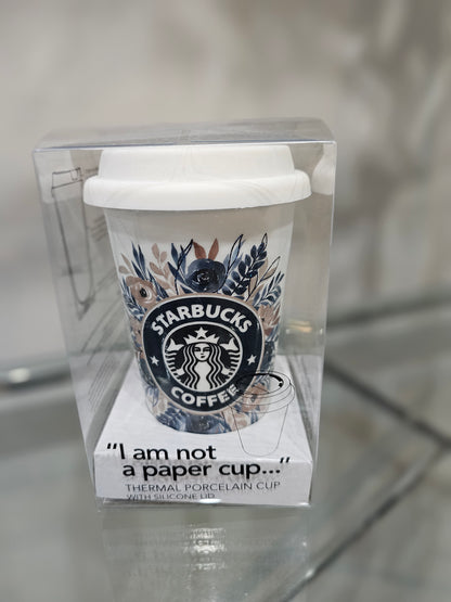 Not a paper cup with Starbucks floral design