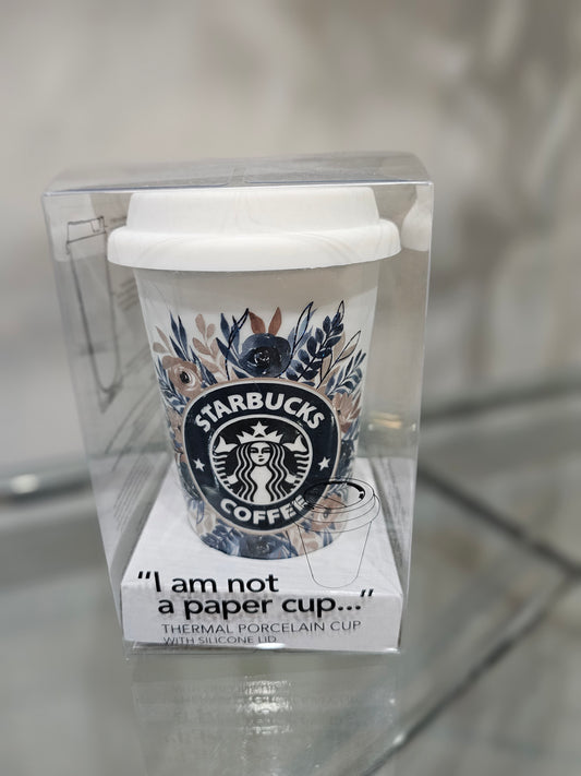 Not a paper cup with Starbucks floral design